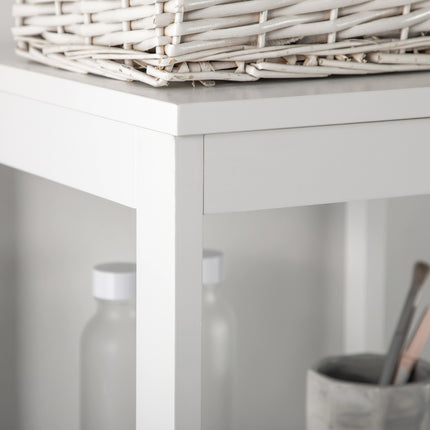 Tall white bathroom cabinet with drawers and shelves