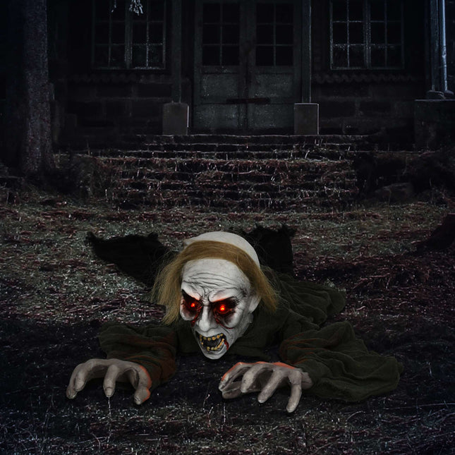 Decorațiune de Halloween cu zombi târâtori și ochi strălucitori