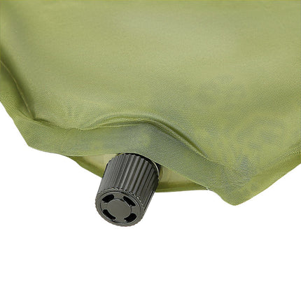 Pernă de camping verde cu autoumflare, compactă și portabilă