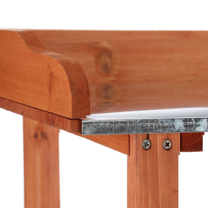 Planter table with metal plate