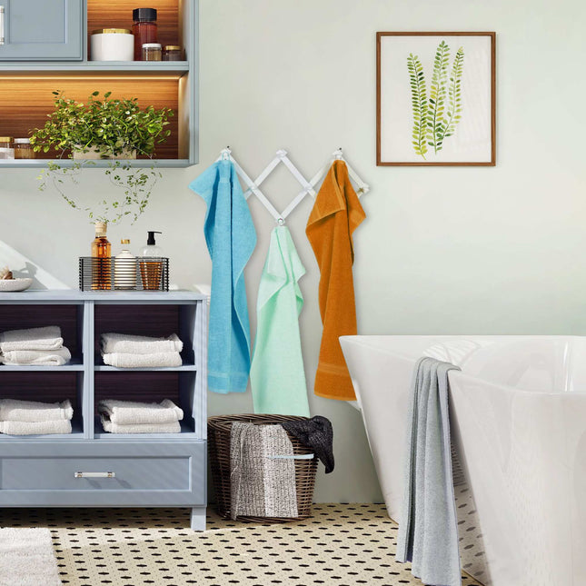 Retractable wall coat hanger in wood