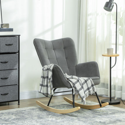 Dark gray rocking chair in velvet look with armrests