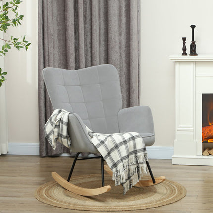 Light gray rocking chair in velvet look with wooden runners