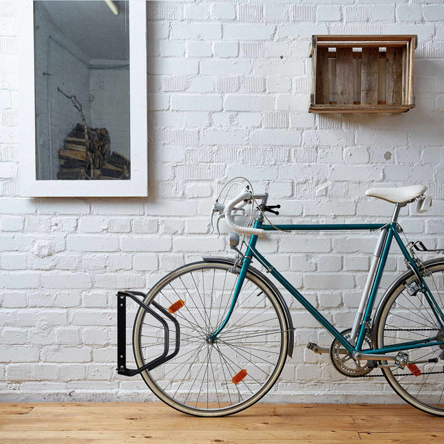 Suport de biciclete pivotant, montat pe perete